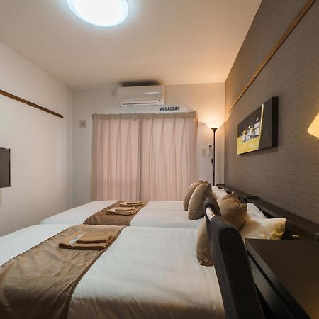 มิสเตอร์คินทาโระ Aparthotel นาฮะ ภายนอก รูปภาพ
