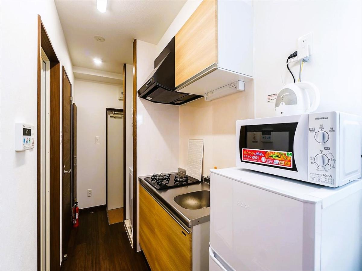 มิสเตอร์คินทาโระ Aparthotel นาฮะ ภายนอก รูปภาพ
