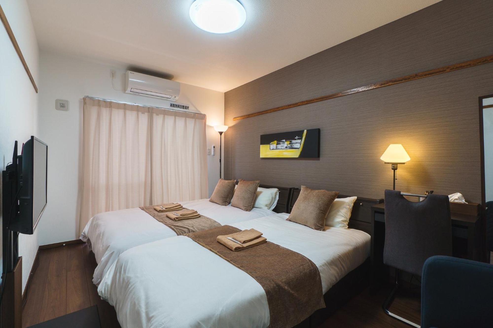 มิสเตอร์คินทาโระ Aparthotel นาฮะ ภายนอก รูปภาพ