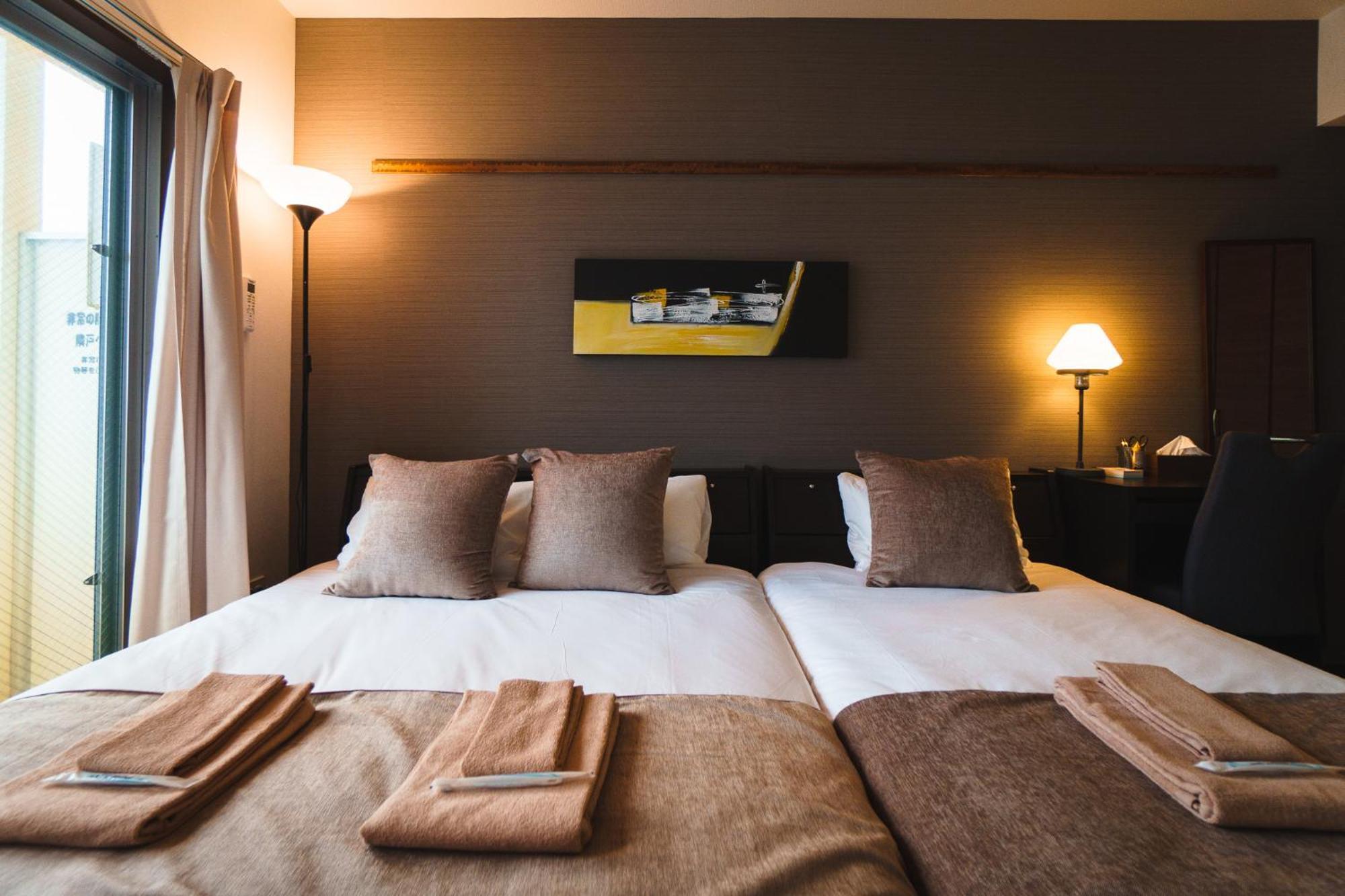 มิสเตอร์คินทาโระ Aparthotel นาฮะ ภายนอก รูปภาพ