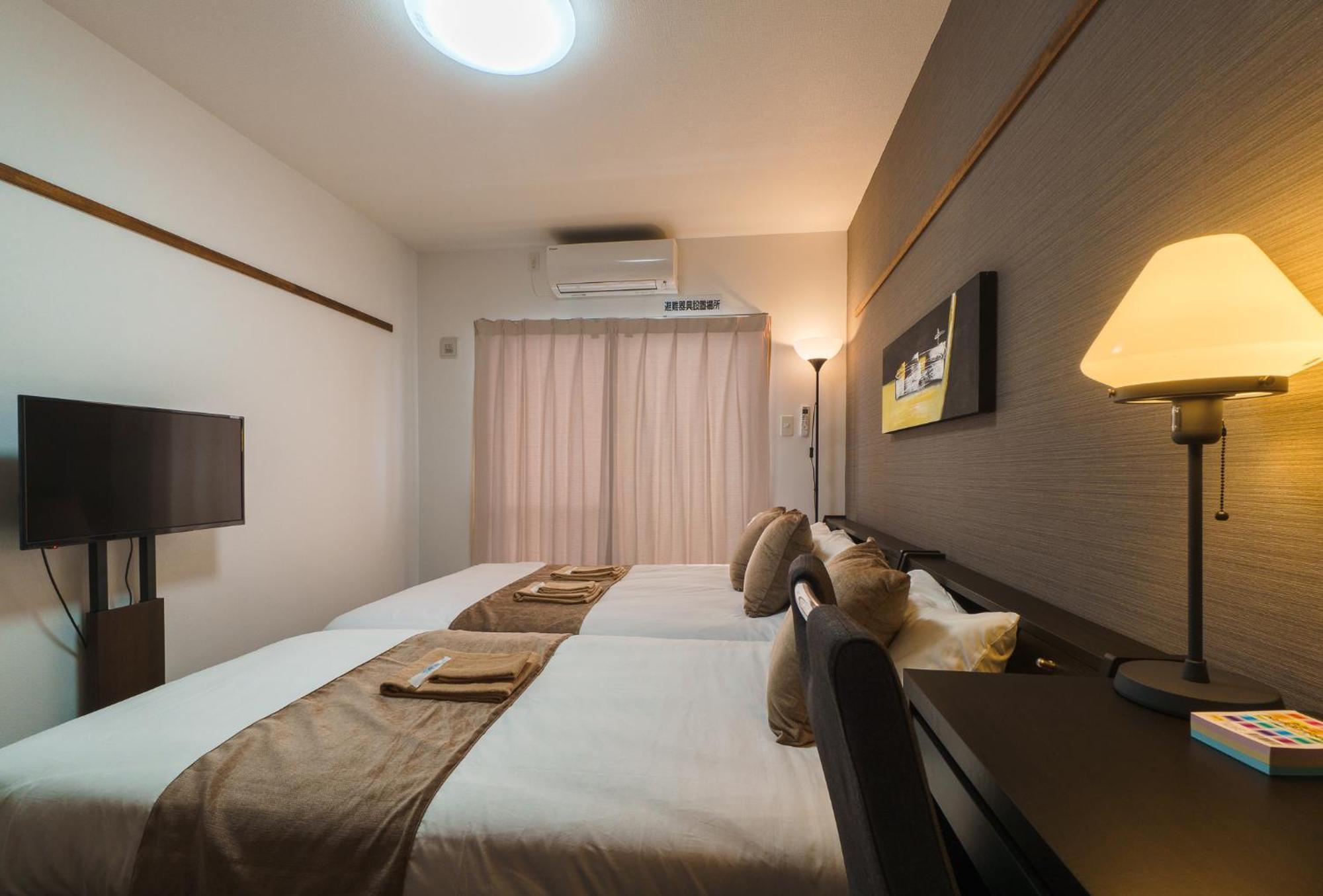มิสเตอร์คินทาโระ Aparthotel นาฮะ ภายนอก รูปภาพ