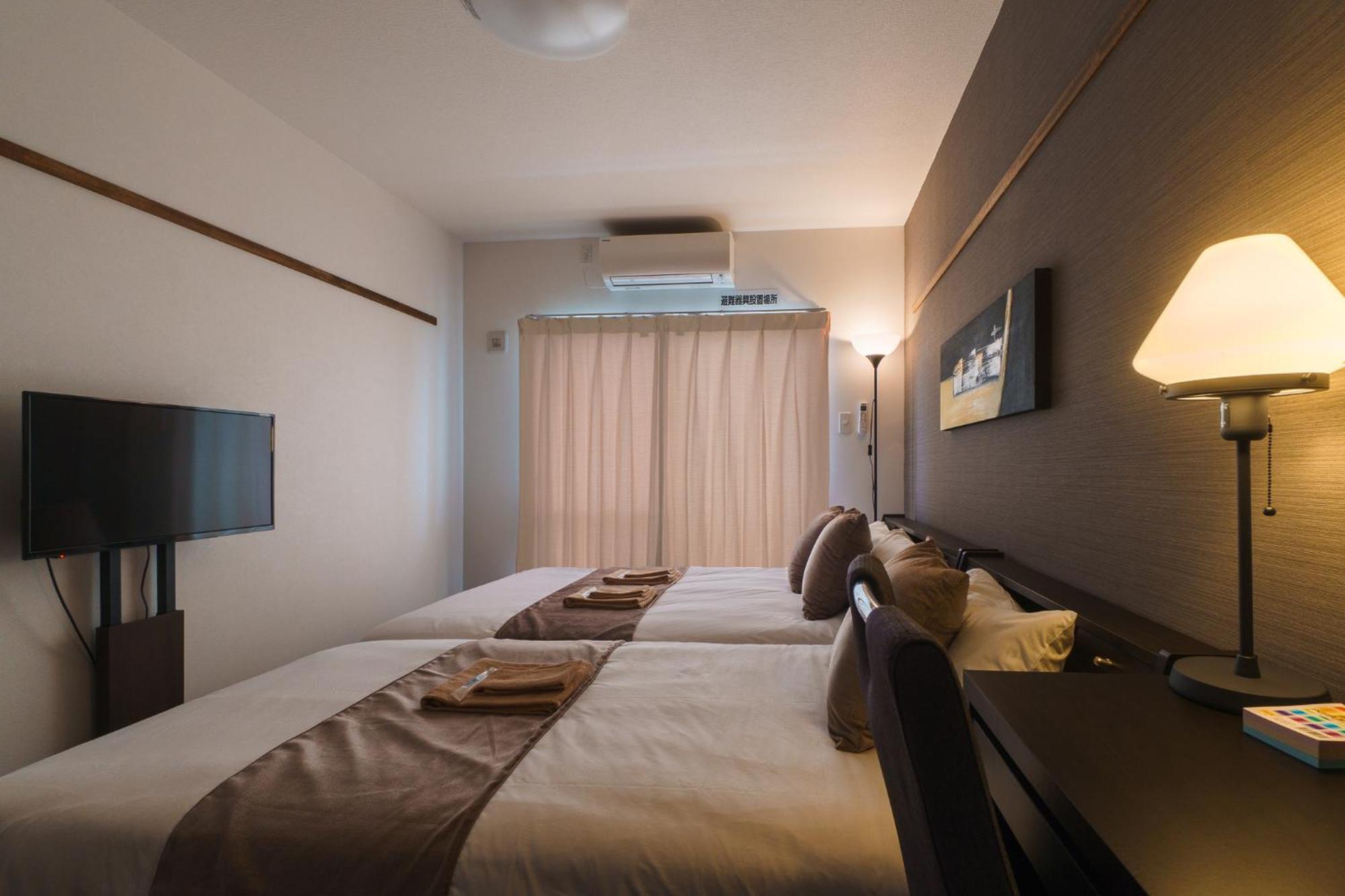 มิสเตอร์คินทาโระ Aparthotel นาฮะ ภายนอก รูปภาพ