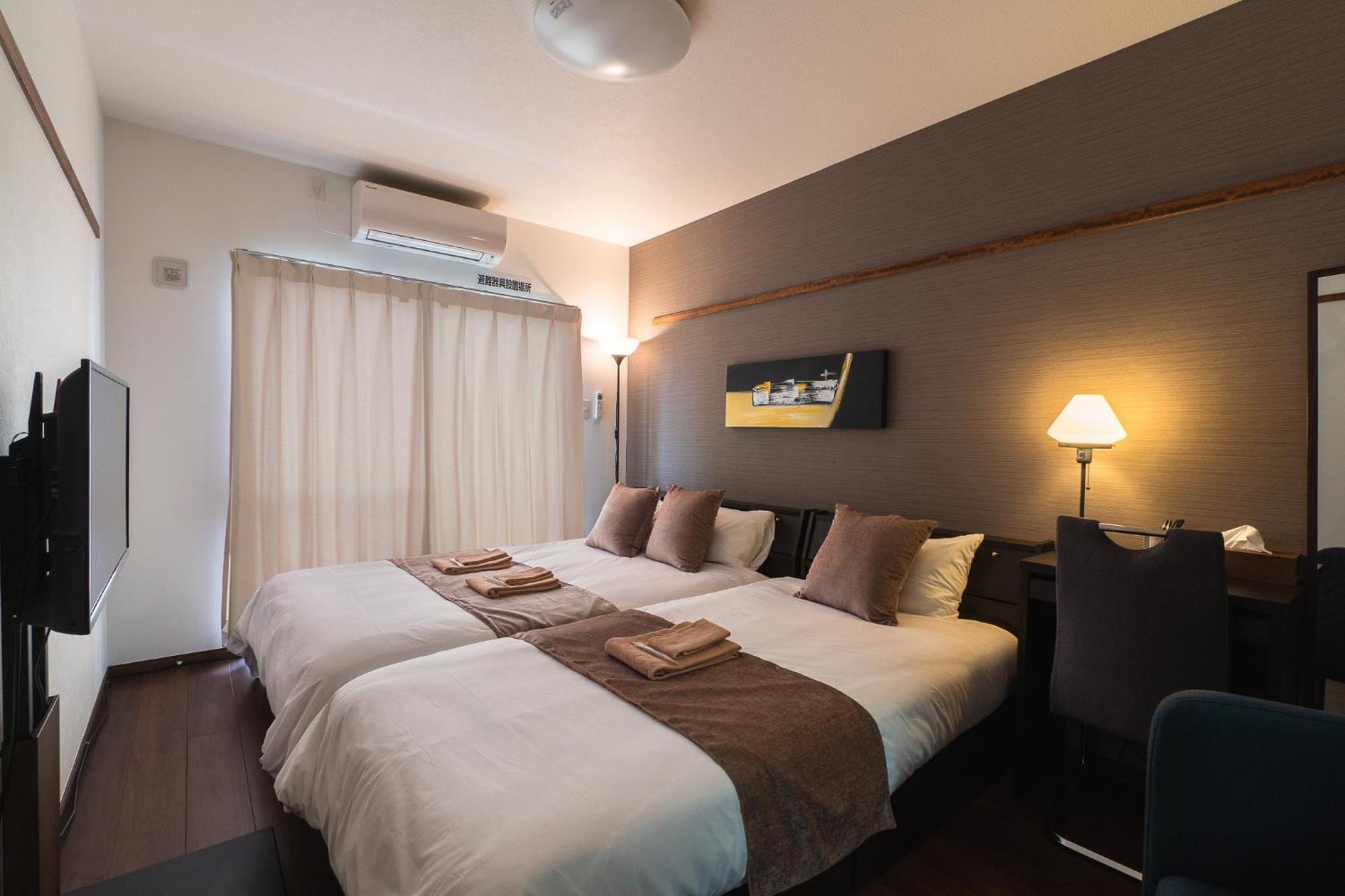 มิสเตอร์คินทาโระ Aparthotel นาฮะ ภายนอก รูปภาพ