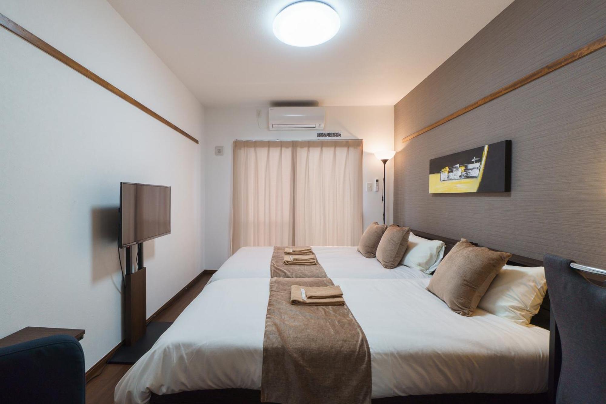 มิสเตอร์คินทาโระ Aparthotel นาฮะ ภายนอก รูปภาพ