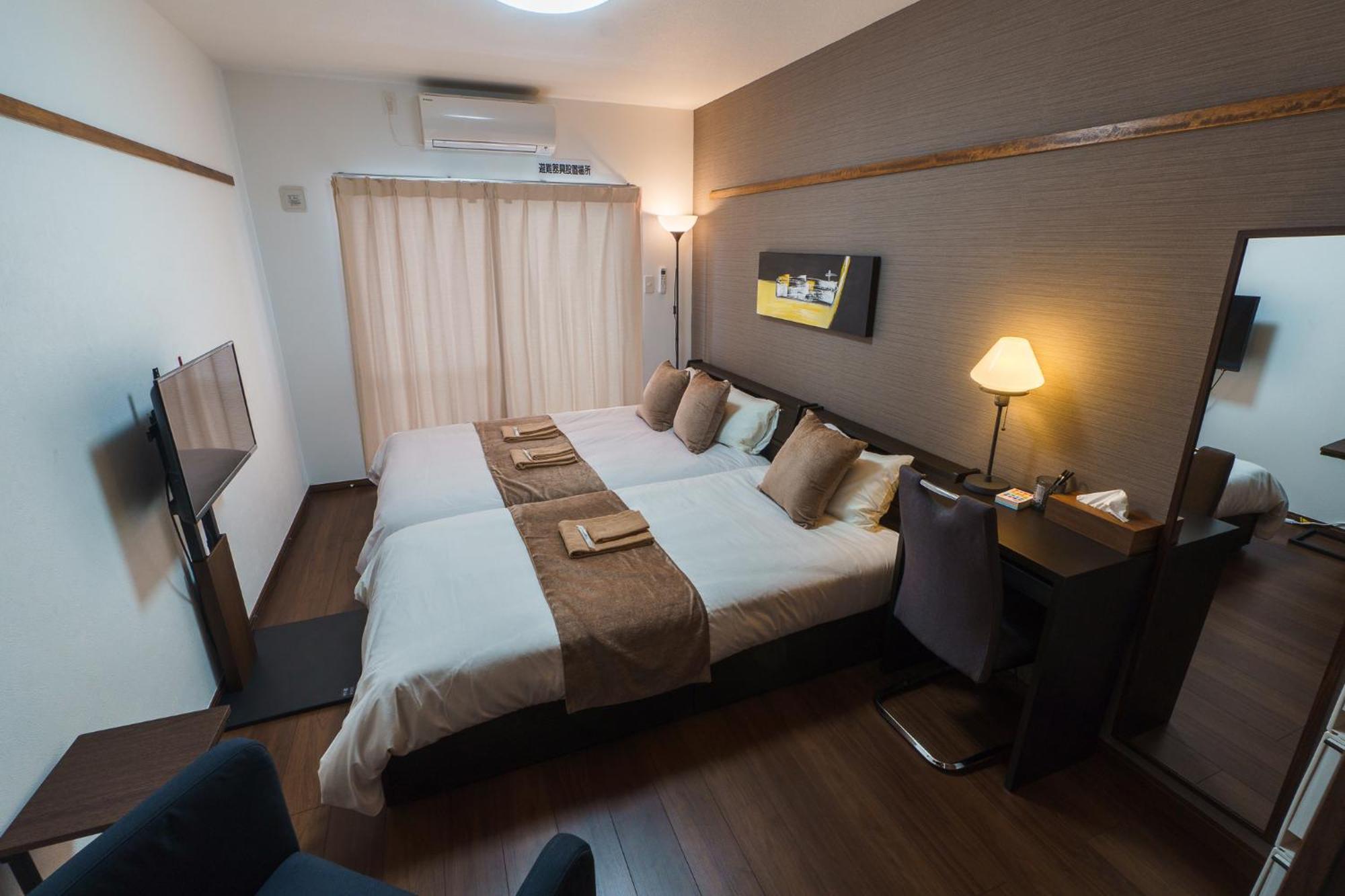 มิสเตอร์คินทาโระ Aparthotel นาฮะ ภายนอก รูปภาพ