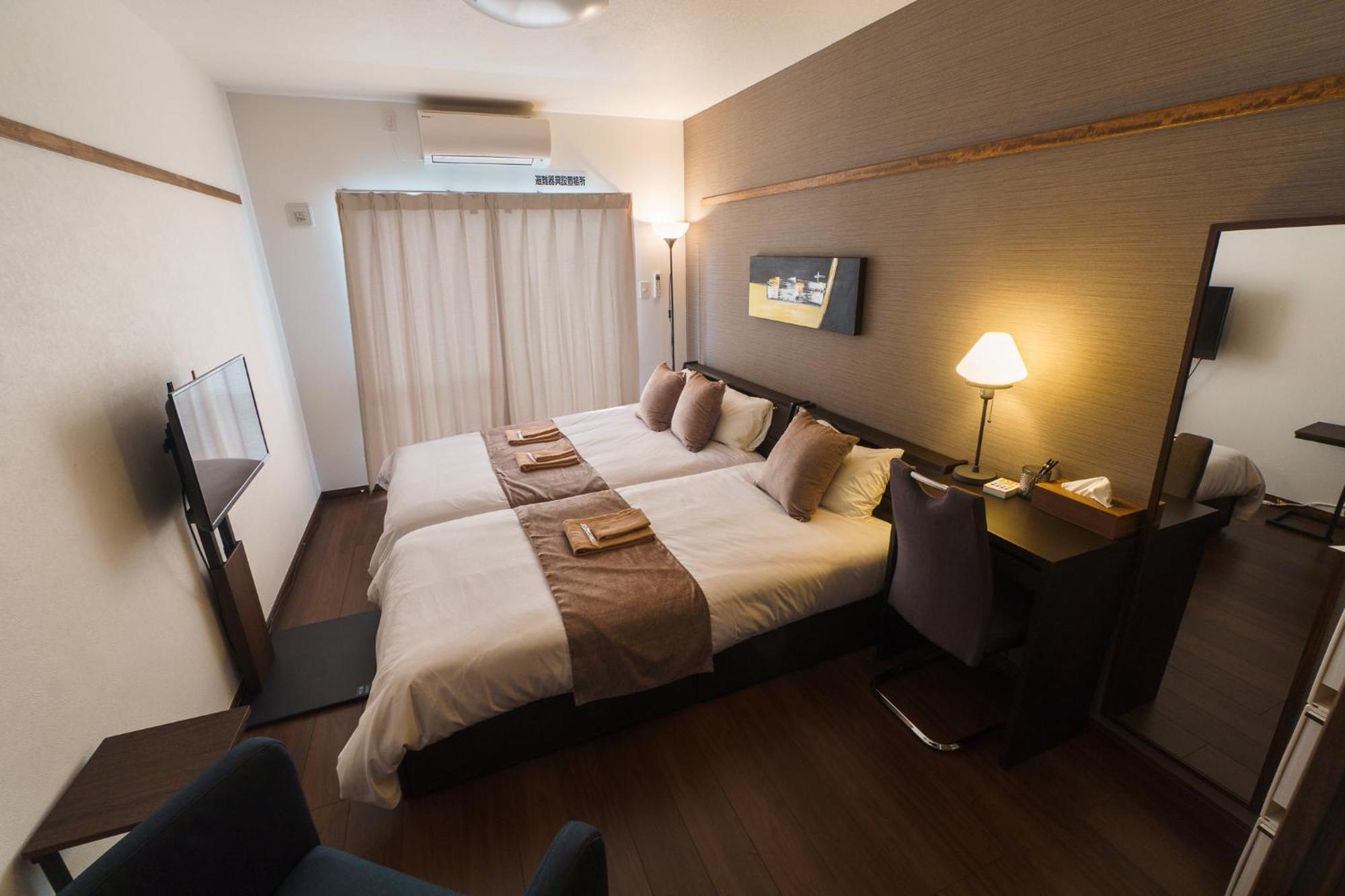 มิสเตอร์คินทาโระ Aparthotel นาฮะ ภายนอก รูปภาพ