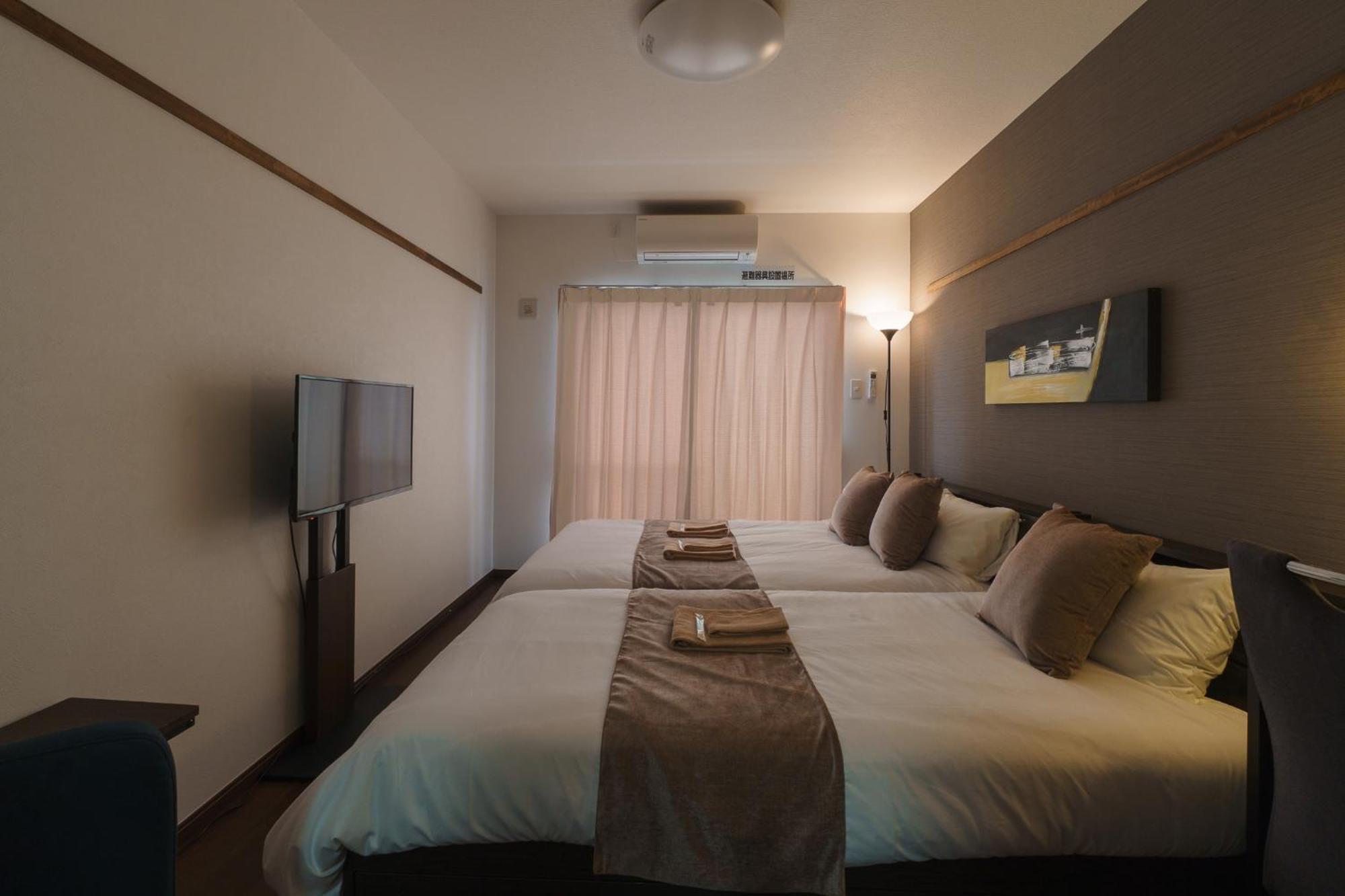 มิสเตอร์คินทาโระ Aparthotel นาฮะ ภายนอก รูปภาพ