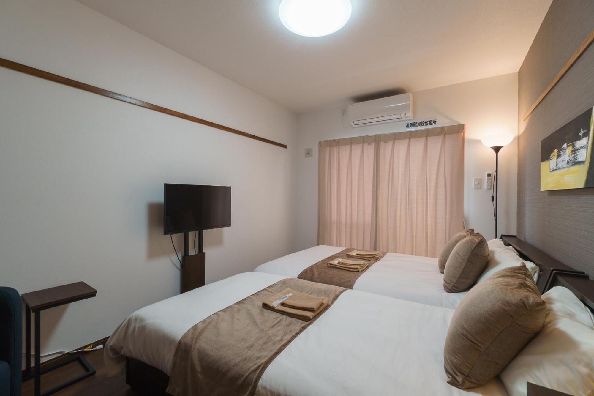 มิสเตอร์คินทาโระ Aparthotel นาฮะ ภายนอก รูปภาพ