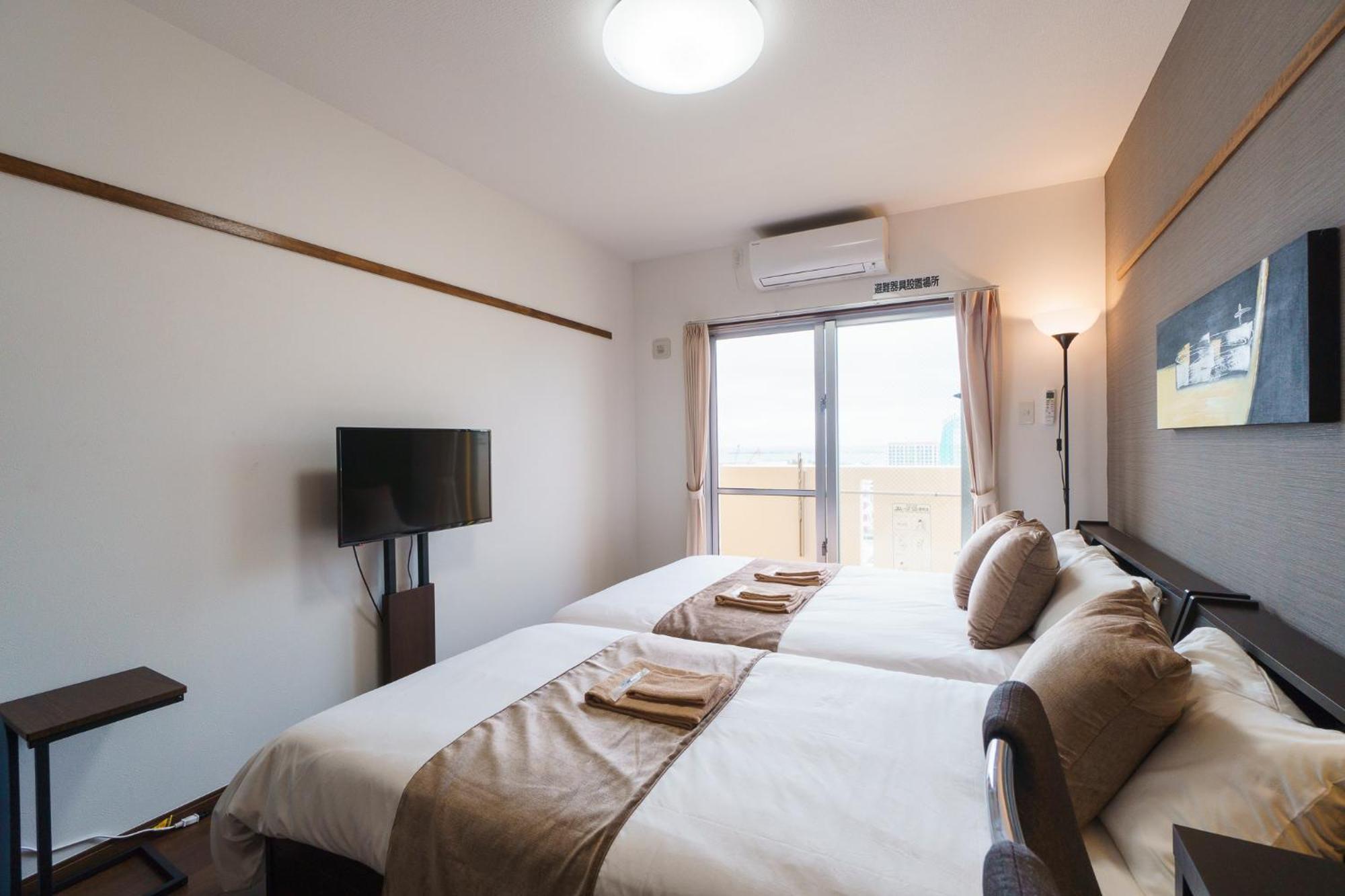 มิสเตอร์คินทาโระ Aparthotel นาฮะ ภายนอก รูปภาพ
