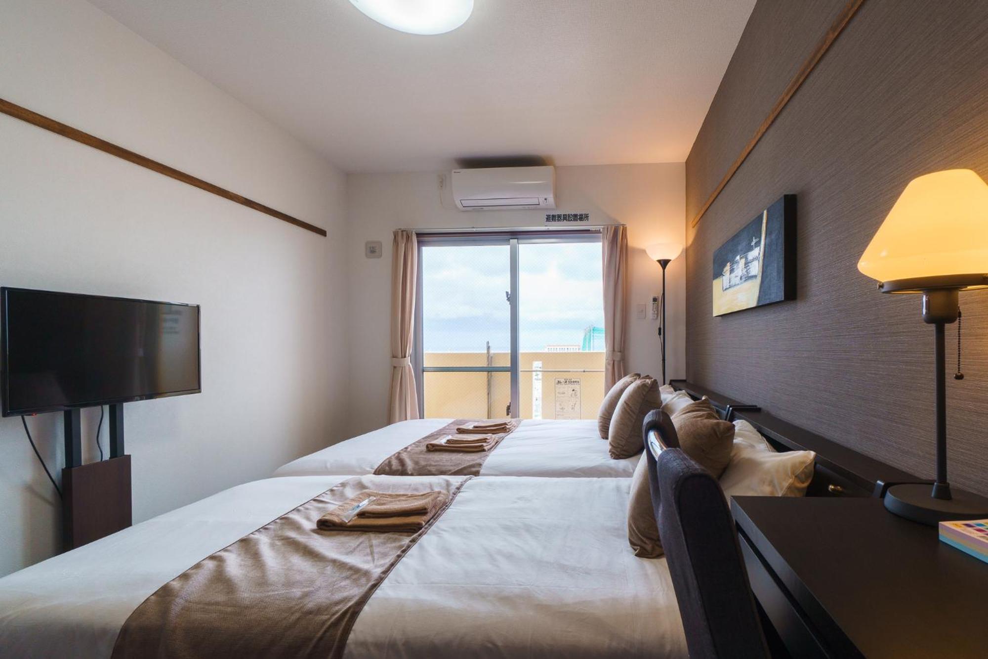 มิสเตอร์คินทาโระ Aparthotel นาฮะ ภายนอก รูปภาพ