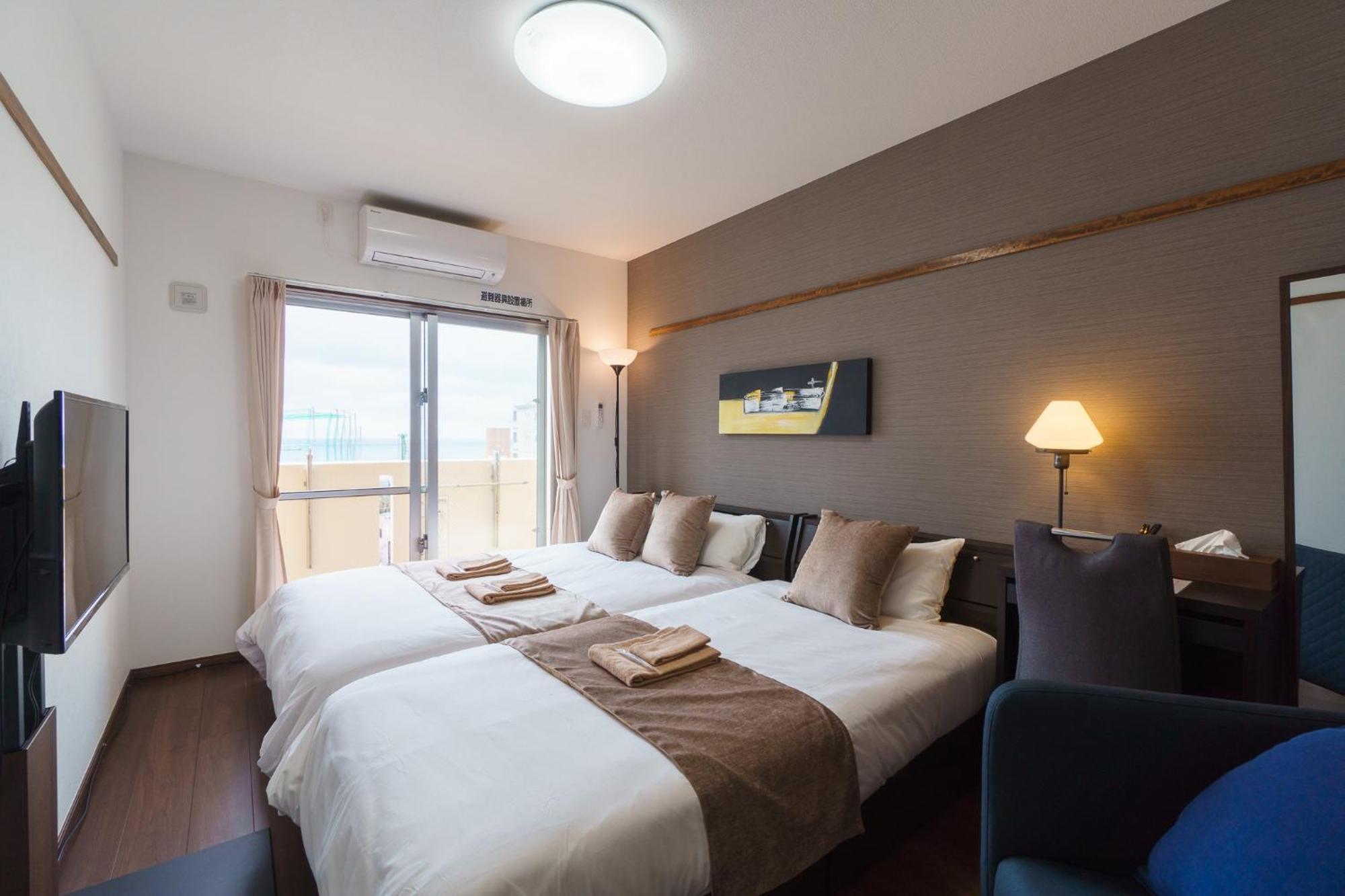 มิสเตอร์คินทาโระ Aparthotel นาฮะ ภายนอก รูปภาพ