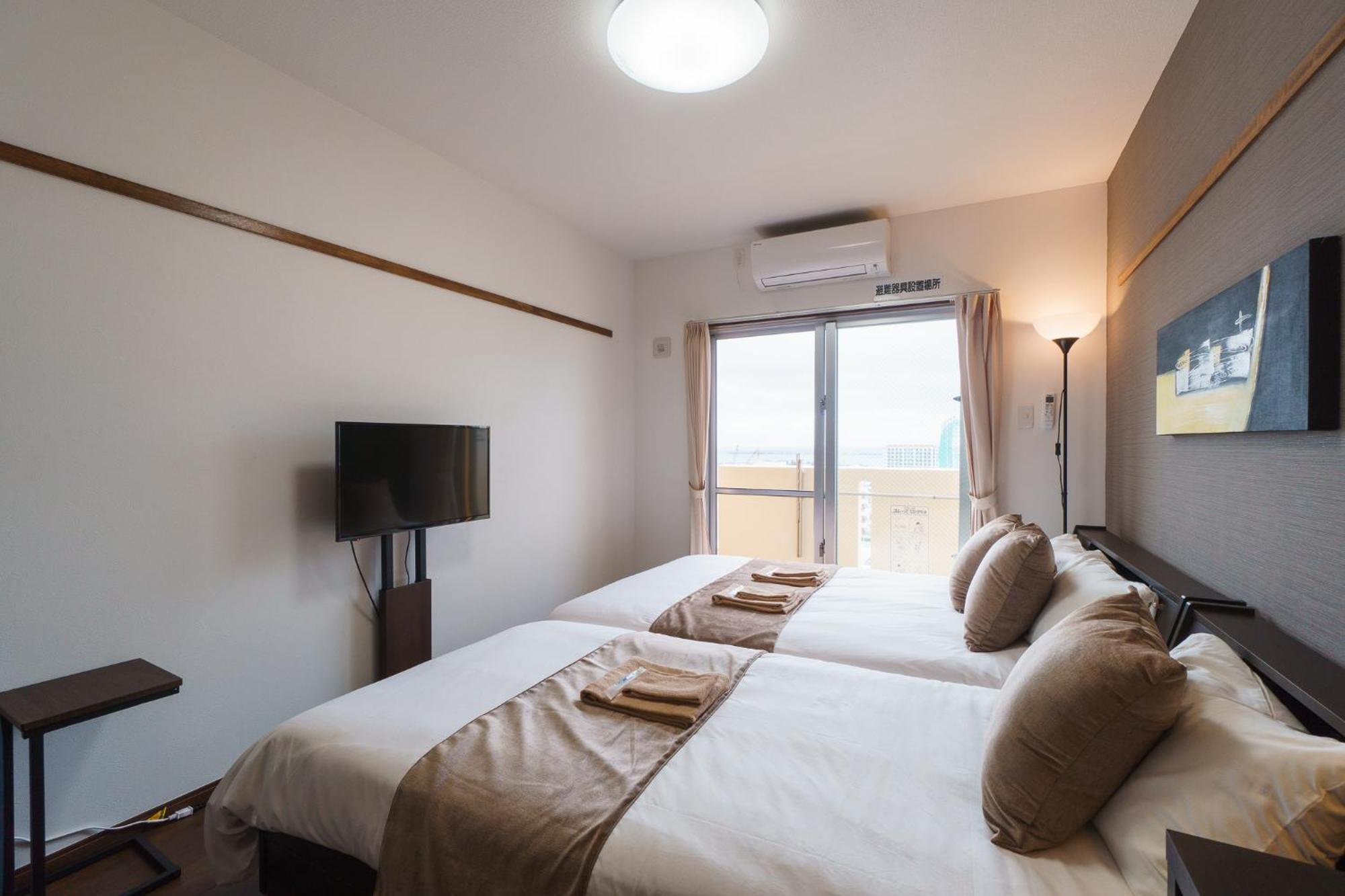 มิสเตอร์คินทาโระ Aparthotel นาฮะ ภายนอก รูปภาพ
