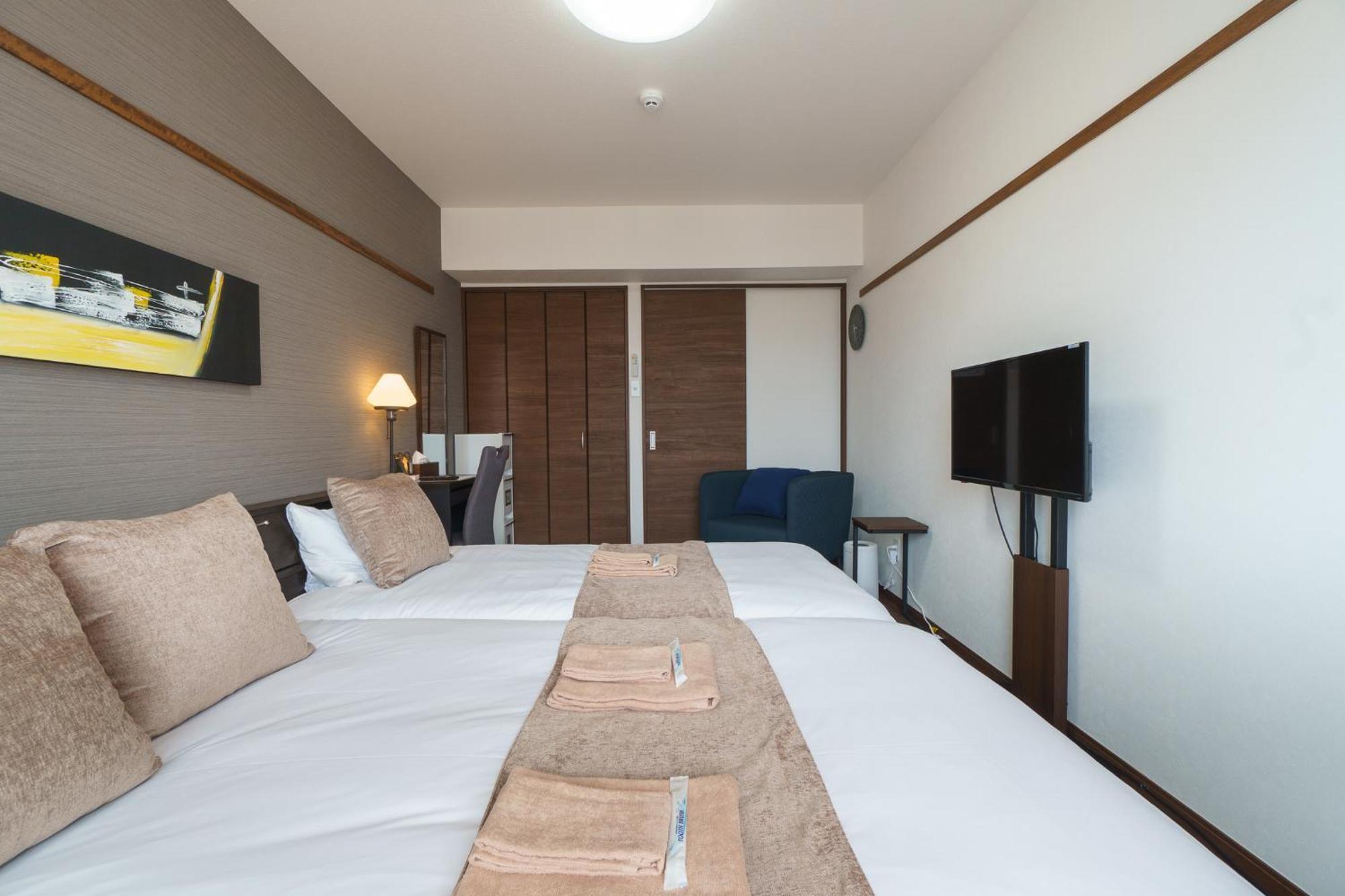 มิสเตอร์คินทาโระ Aparthotel นาฮะ ภายนอก รูปภาพ