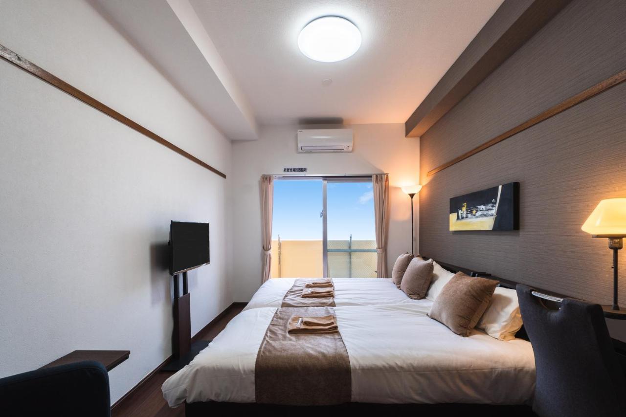 มิสเตอร์คินทาโระ Aparthotel นาฮะ ภายนอก รูปภาพ
