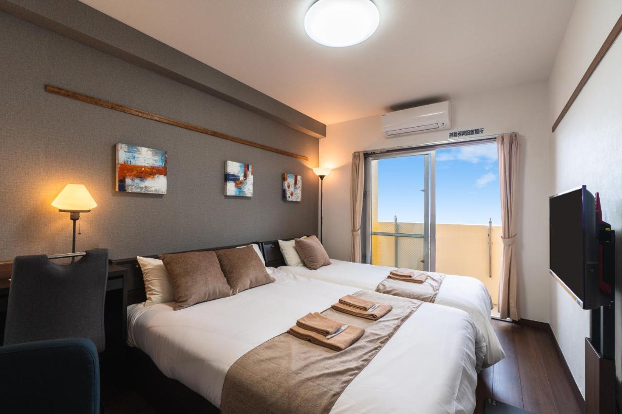 มิสเตอร์คินทาโระ Aparthotel นาฮะ ภายนอก รูปภาพ