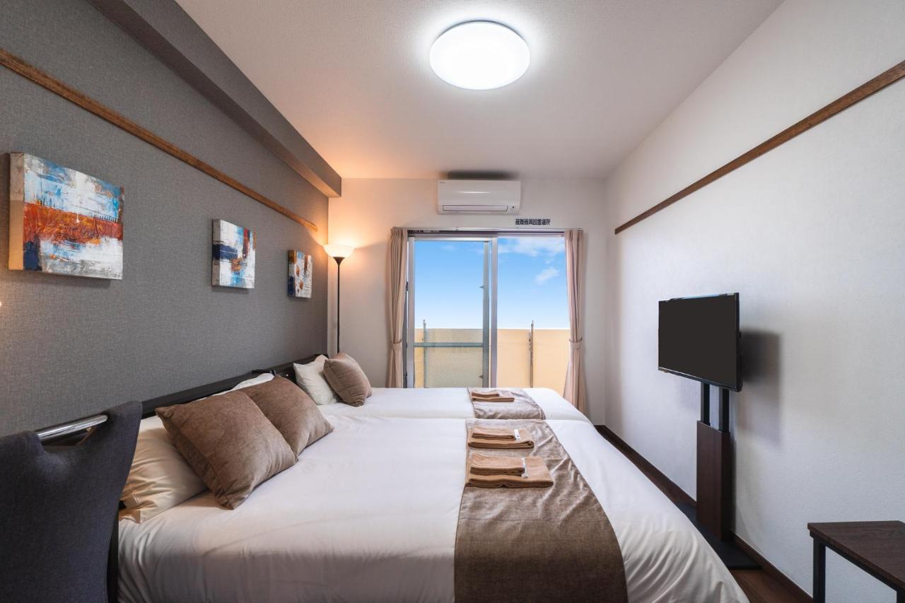 มิสเตอร์คินทาโระ Aparthotel นาฮะ ภายนอก รูปภาพ